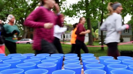 This runner was bothered by blizzard of disposable cups at races. She invented something better