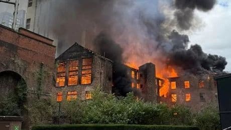Manchester fire LIVE: Blaze breaks out by train station as smoke seen for miles