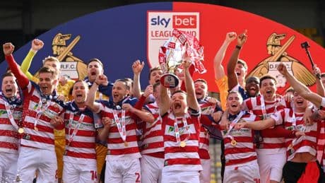 Fans spot something awkward in trophy reflection after Doncaster boss posts pic of himself in bed ‘sleeping’ with cup