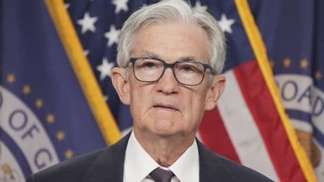 U.S. Fed holds interest rates despite pressure from Trump to cut
