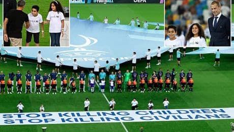 UEFA claim their 'Stop killing children' Super Cup banner is NOT political after sparking Israeli anger with gesture days after Mohamed Salah criticised their tribute to 'Palestinian Pele'
