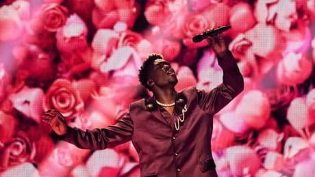 Claude, representing the Netherlands, is a refugee turned pop star.