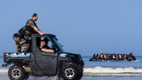 French cops pictured in buggies paid for by UK but still can't stop migrant boats