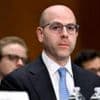 Trump's Fed pick says he will keep White House job