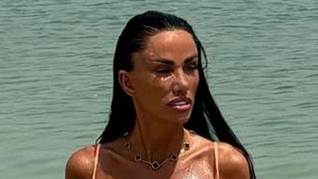 Katie Price stuns in bold bikini on Dubai beach after being issued indecency 'arrest' warning