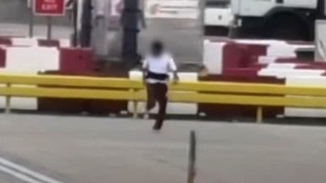 Shocking moment man is chased across taxiway at Heathrow Airport near moving aircraft before being arrested