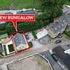 Owner of Grade II listed £800k estate at war with neighbours after building BUNGALOW in back garden without permission