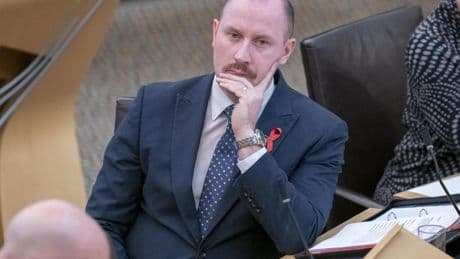 Neil Gray in Japan despite cancer treatment waiting times reaching record levels