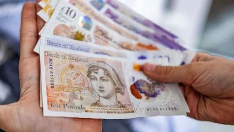 Call to 670,000 people who could be charged up to £420 to access their own money
