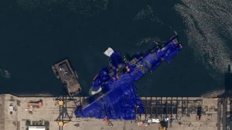 Watch: Satellite images show North Korean warship laying on its side after botched launch