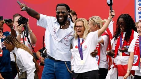 England manager Sarina Wiegman sings and dances with Burna Boy at Euro 2025 victory parade