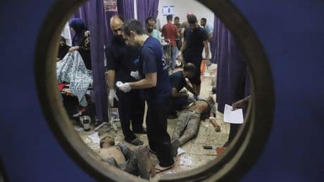 32 Palestinians killed trying to reach food distribution hubs, Gaza authorities say