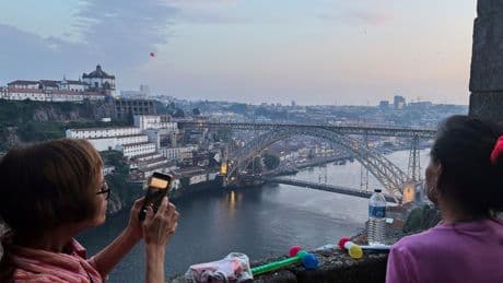Porto celebrates the summer and its patron saint with plastic hammers, sardines and leeks