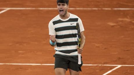 Carlos Alcaraz defends French Open title after epic tussle with Jannik Sinner