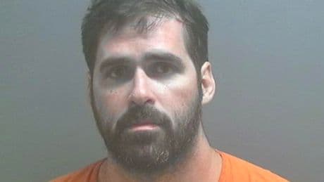 Murder suspect arrested in woods in his underwear after his ex’s new boyfriend was shot dead