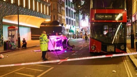 Three people seriously hurt after a rickshaw and bus collide in central London