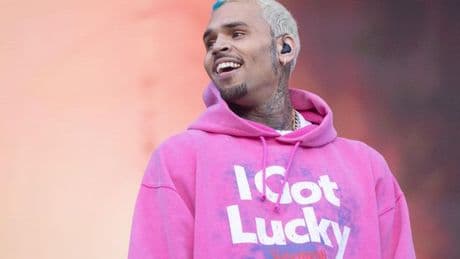 Fury as abuser Chris Brown gets to play Hampden while Kneecap axed from TRNSMT