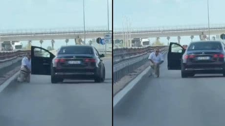 Commando armato blocca auto in strada: uomo rapinato e in ginocchio, le immagini choc
