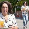Iconic '80s lead singer who was born without an ear looks unrecognizable in rare outing... can you guess who?
