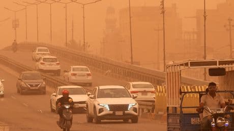 Sandstorm Turns Iraq’s Skies Orange and Sends Thousands to Hospitals