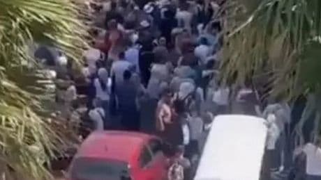 Town overrun by 75,000 tourists sparking 'gridlock' as sightseers wait 'hours'
