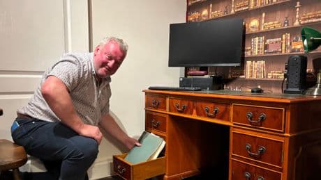 Son reunited with hero dad's WW2 documents hidden in old desk
