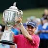 Don't drop it! The PGA Championship's 27-pound Wanamaker Trophy can be a beast to hoist