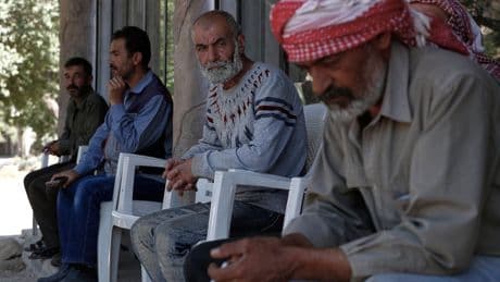 Israel raids a Syrian village and detains suspected militants; 1 person is killed