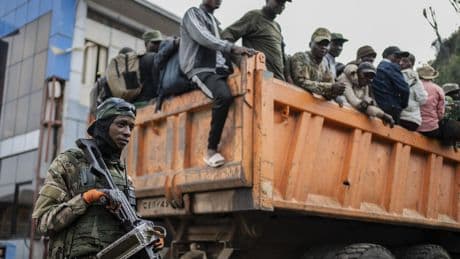 Red Cross escorts hundreds of stranded Congolese soldiers from rebel-controlled city to capital