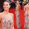 Bold and Beautiful! Margot Robbie looks incredible in breathtaking sheer gown with a daring open back for London premiere of new movie with Colin Farrell
