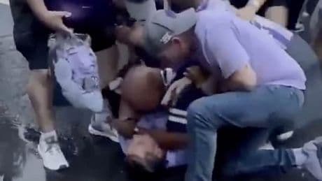 Kansas State QB Avery Johnson's dad gets into fist-fight with his other son in wild parking lot brawl after game