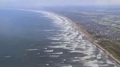 Woman dies in Japan tsunami evacuation after car plunges off cliff