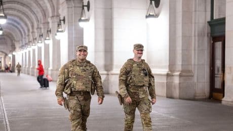 Photos: Scenes from D.C. as National Guard patrols start carrying weapons