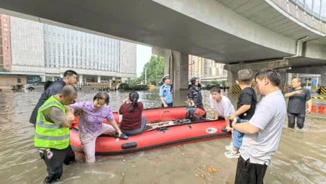 China orders 'all-out' rescue operation as 10 killed and dozens missing after floods