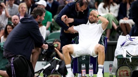 Grigor Dimitrov’s upset bid against Jannik Sinner halted by injury in Wimbledon crusher