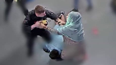 Officer denies he 'lost control' attempting to arrest brothers at Manchester Airport, court hears