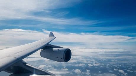 I'm a travel writer — the 1 unusual item I always pack for long-haul flights