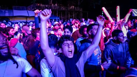 Scenes from a jubilant night at Knicks watch party as excited fans watch team keep season alive