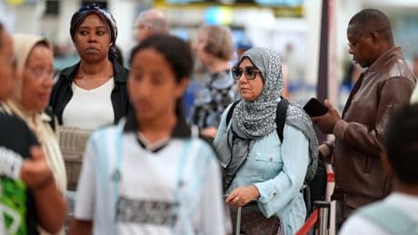 A downturn in international travel to the U.S. may last beyond summer, experts warn