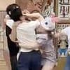 Shocking moment families brawl at Disneyland after 'row over queue cutting'