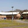UK's first secure school for youngsters in custody is forced to close after weapon-making child inmates 'kicked down every internal door' and had 'free rein on building'