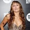ADRIAN THRILLS reviews Miley Cyrus' Something Beautiful: Miley channels her inner Pink Flloyd for ambitious concept album