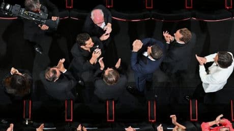 The truth behind those absolutely crazy 20-minute film festival ovations