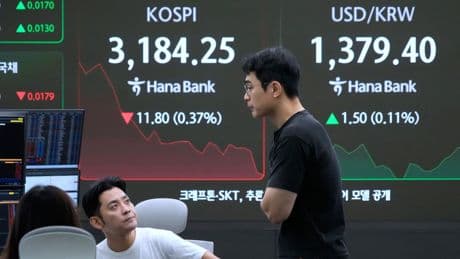 Asian shares are mixed after Wall Street sets more records for US stocks