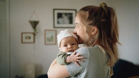 Unlikely couple offer to hold new baby before mum realises who they really are