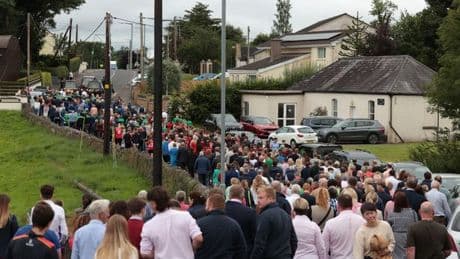 Church 'filled with grief' in service for mum and children killed in shooting