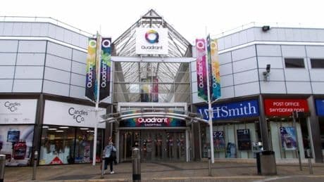Woman died after falling on escalator inside a shopping centre