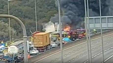 Major lorry fire closes M25 in both directions as smoke and flames fill the sky