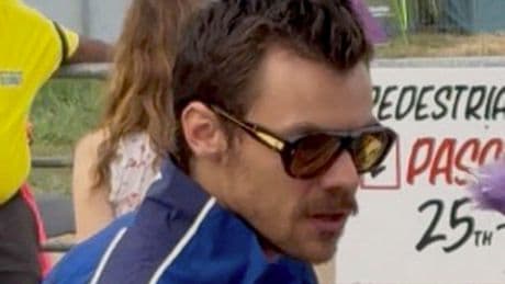 Harry Styles seen at Glastonbury sharing passionate kiss with mystery woman
