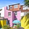 Househunters spot brightly-coloured four-bed terrace on sale for £625,000 - but it's nothing compared to the inside